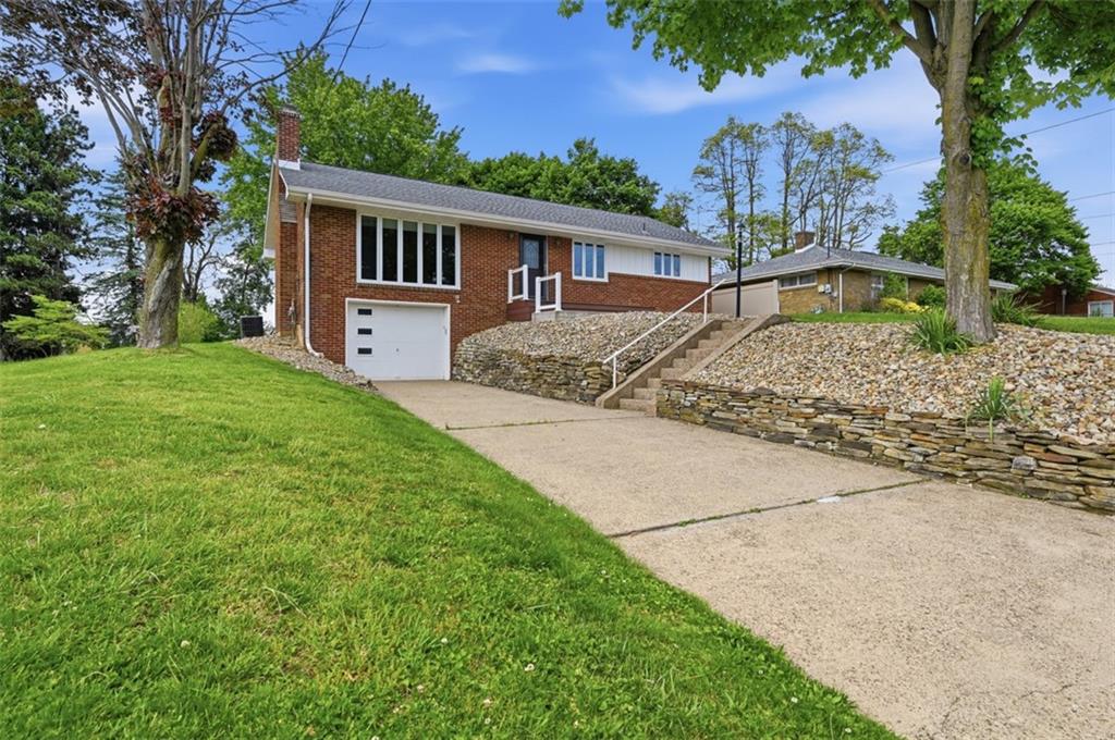 6 Greenview Drive McKees Rocks, PA 15136 - Photo 3 of 44 front view of a house with a yard