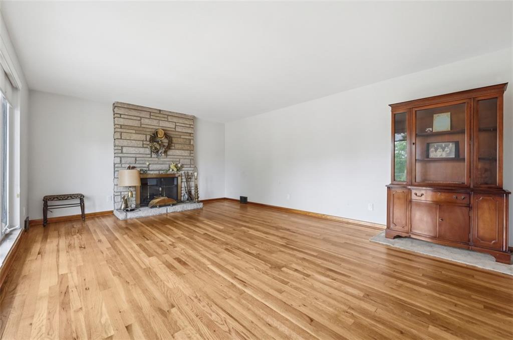 6 Greenview Drive McKees Rocks, PA 15136 - Photo 9 of 44 a view of empty room with wooden floor and fan