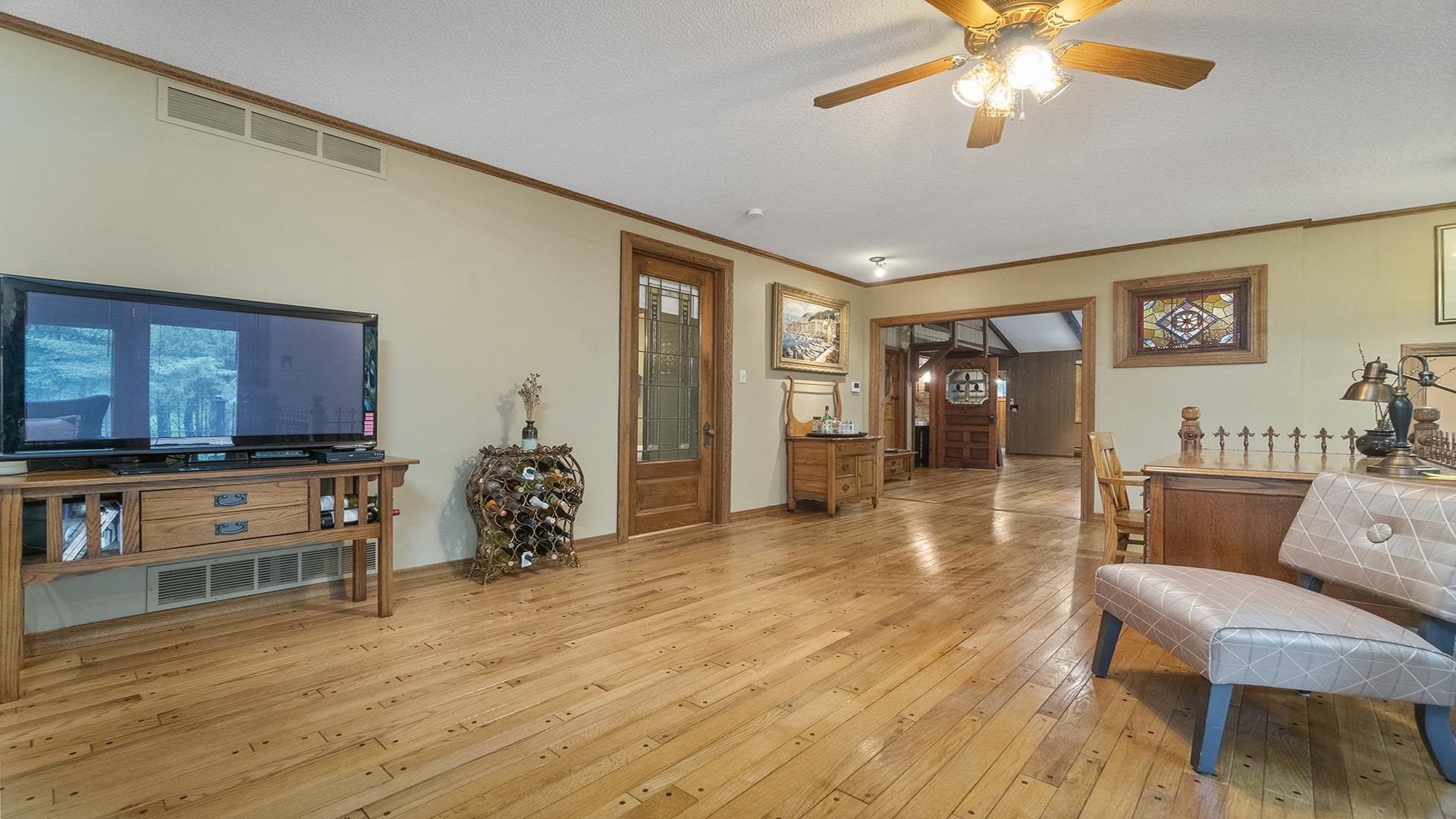 10289 Flory Road Lanark, IL 61046 - Photo 16 of 45 a living room with furniture and a flat screen tv