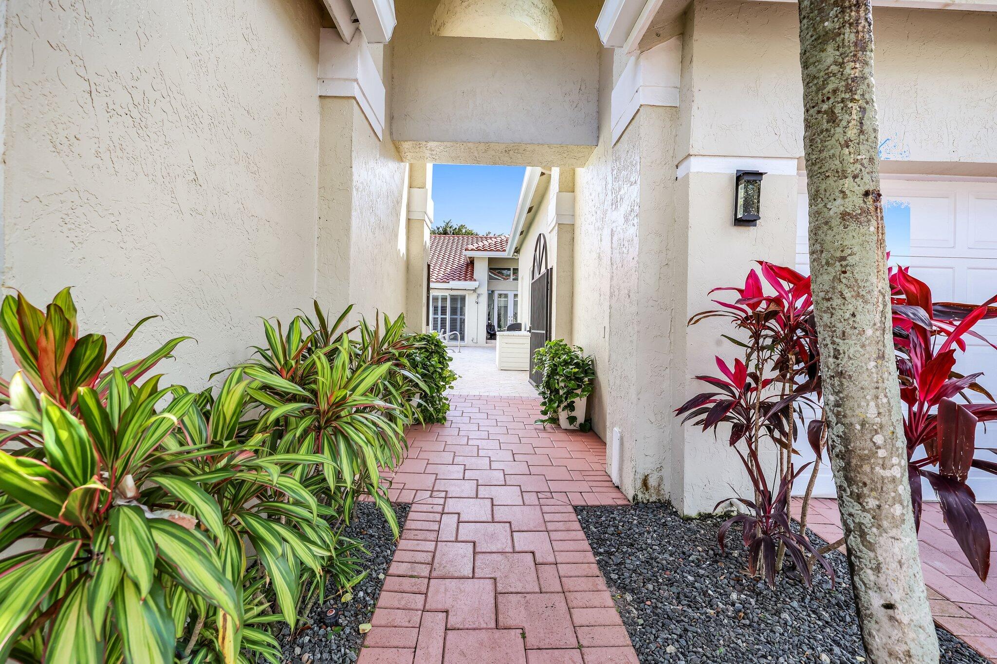 7434 Campo Florido Boca Raton, FL 33433 - Photo 3 of 44 Entrance to Courtyard