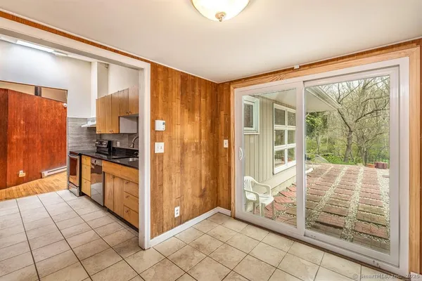 a view of a kitchen with windows