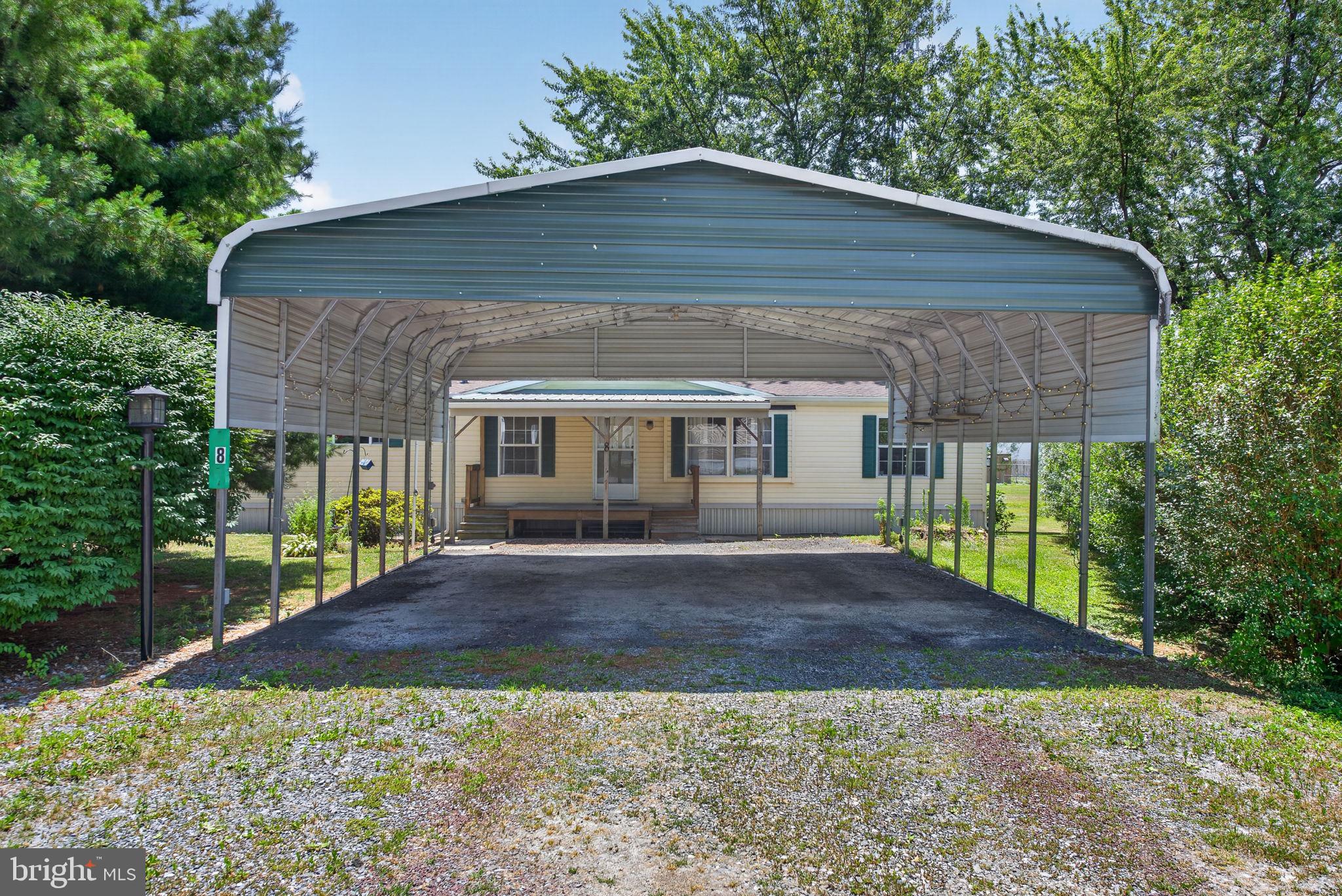 1910 Schubert Road, Unit 8 Bethel, PA 19507 - Photo 3 of 40 A dual vehicle carport protects your vehicles