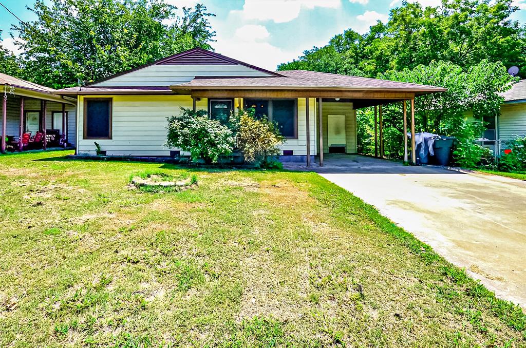 2016 East Cherry Street Sherman, TX 75090 - Photo 1 of 15 a front view of a house with garden