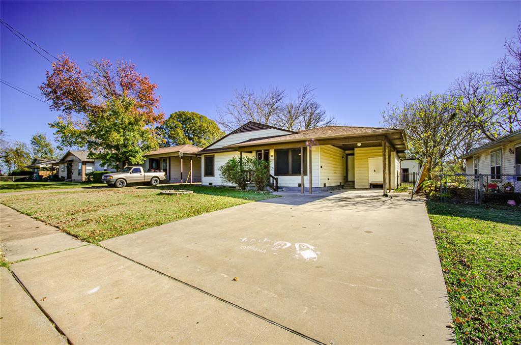 2016 East Cherry Street Sherman, TX 75090 - Photo 15 of 15 a front view of a house with a yard
