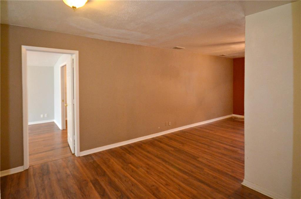 2016 East Cherry Street Sherman, TX 75090 - Photo 7 of 15 a view of a room with wooden floor