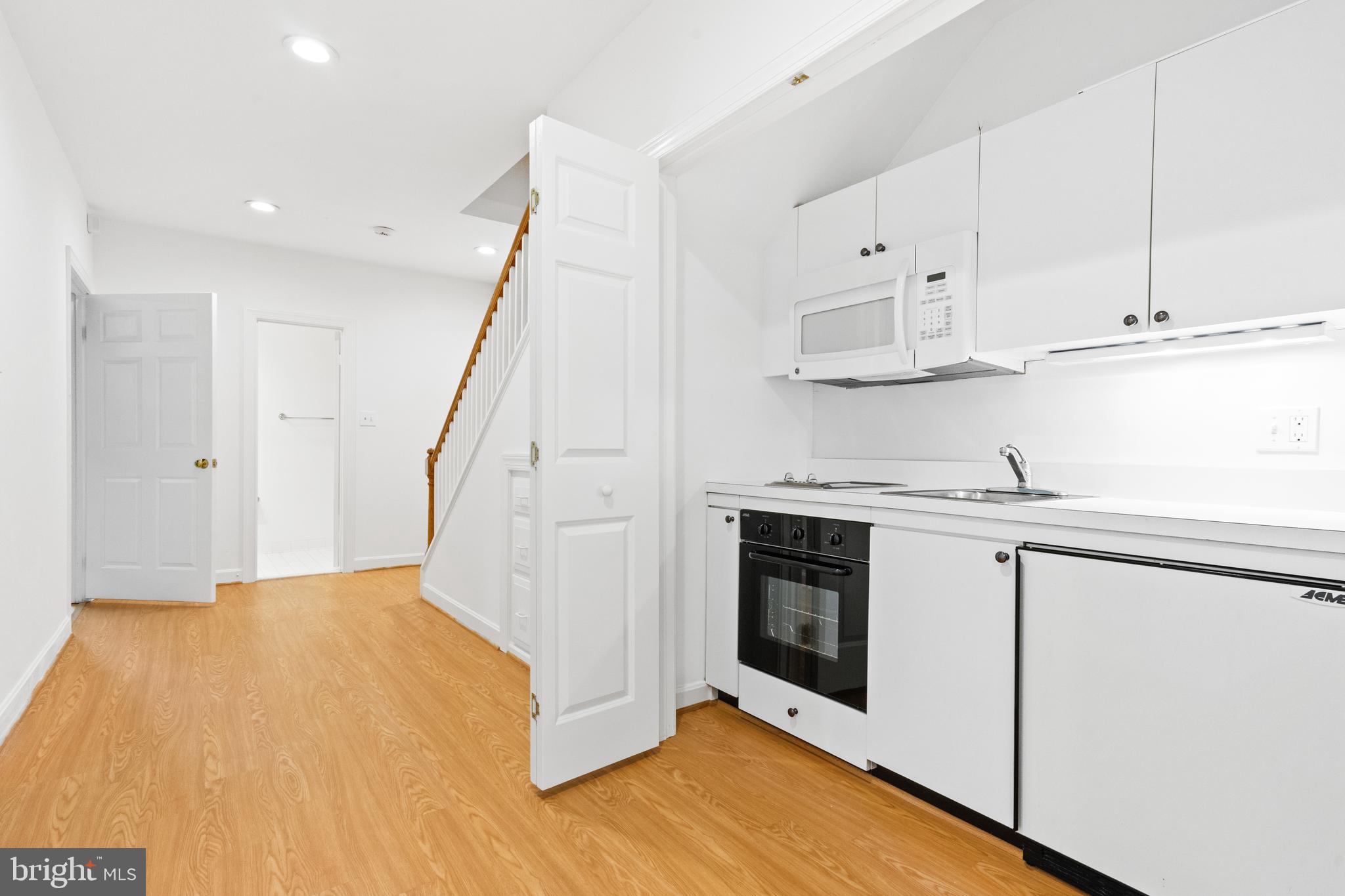 2722 Chain Bridge Road Northwest Washington, DC 20016 - Photo 28 of 43 Lower Level Kitchenette