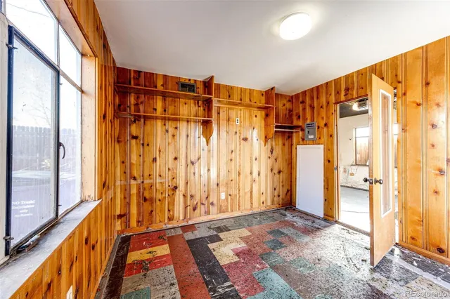 a bathroom with a shower and a sink