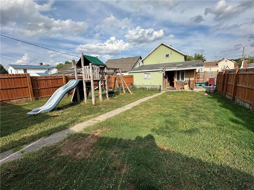 6775 Low Street Mount Pleasant, PA 15666 - Photo 19 of 23 a view of a big yard next to a house