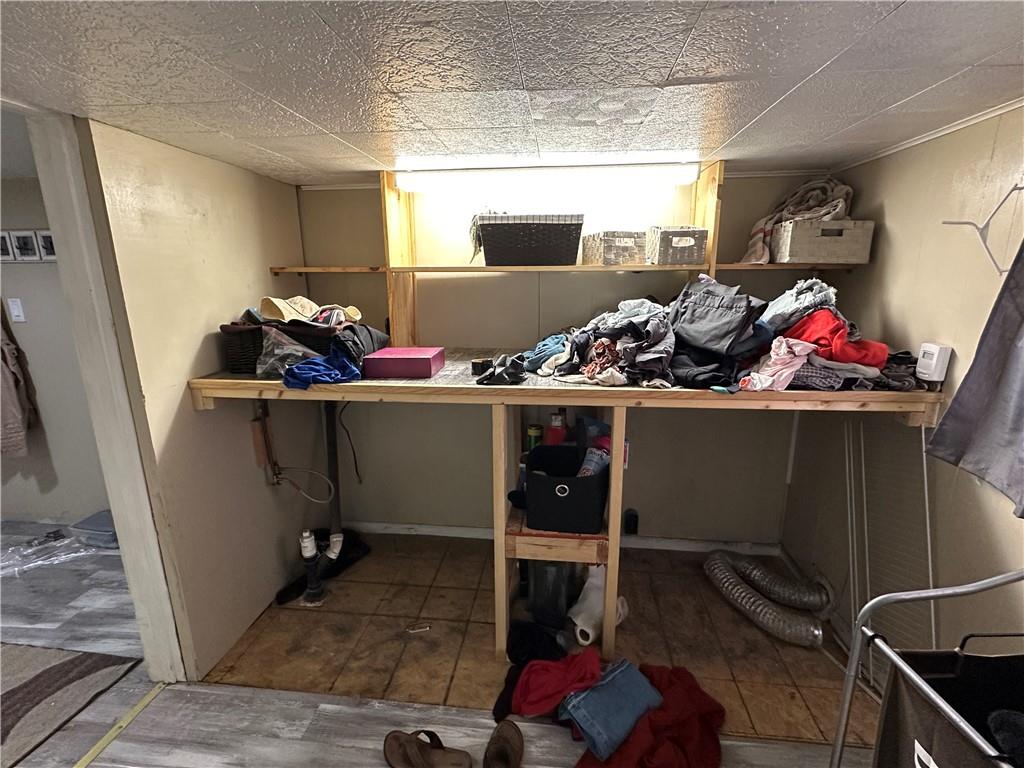 6775 Low Street Mount Pleasant, PA 15666 - Photo 7 of 23 a room with a chair and a window