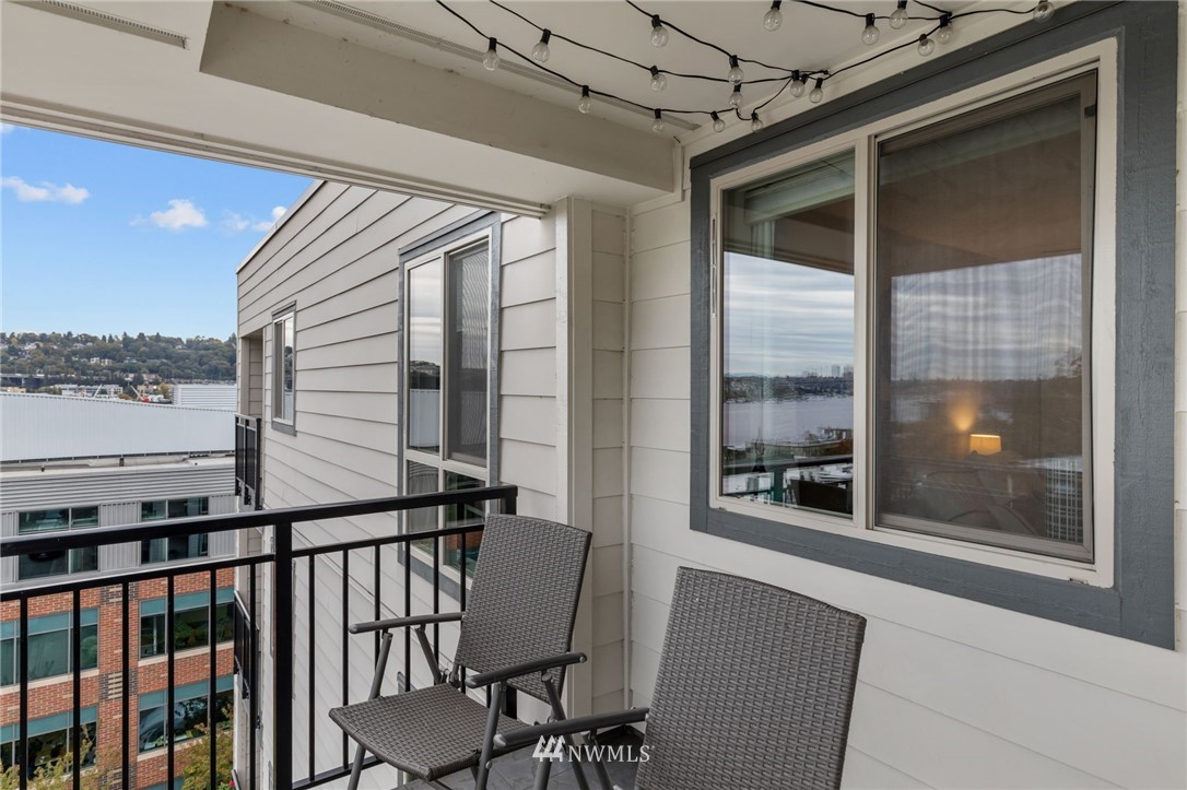 769 Hayes Street, Unit 609 Seattle, WA 98109 - Photo 23 of 26 a view of a balcony with furniture