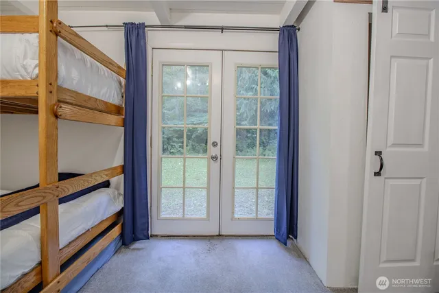 a view of a house with a yard and garage