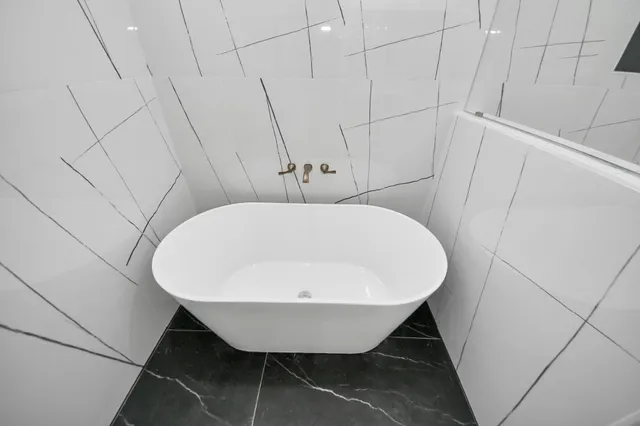 a view of entryway with kitchen