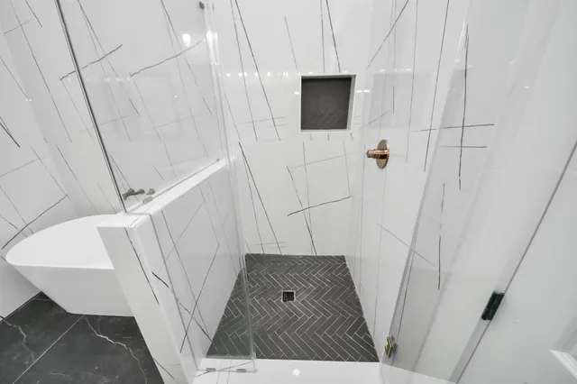 a view of entryway with wooden floor