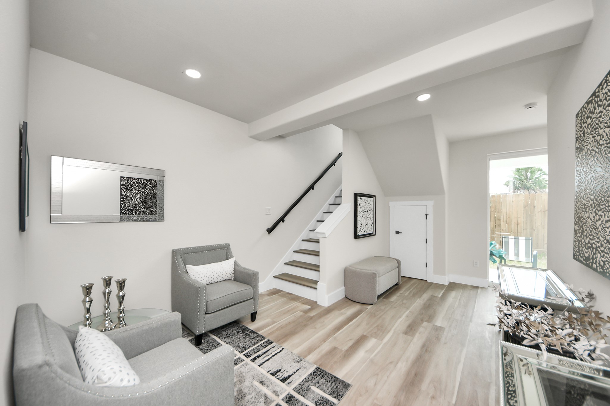 2016 Blodgett Street Houston, TX 77004 - Photo 5 of 49 a living room with furniture and a wooden floor