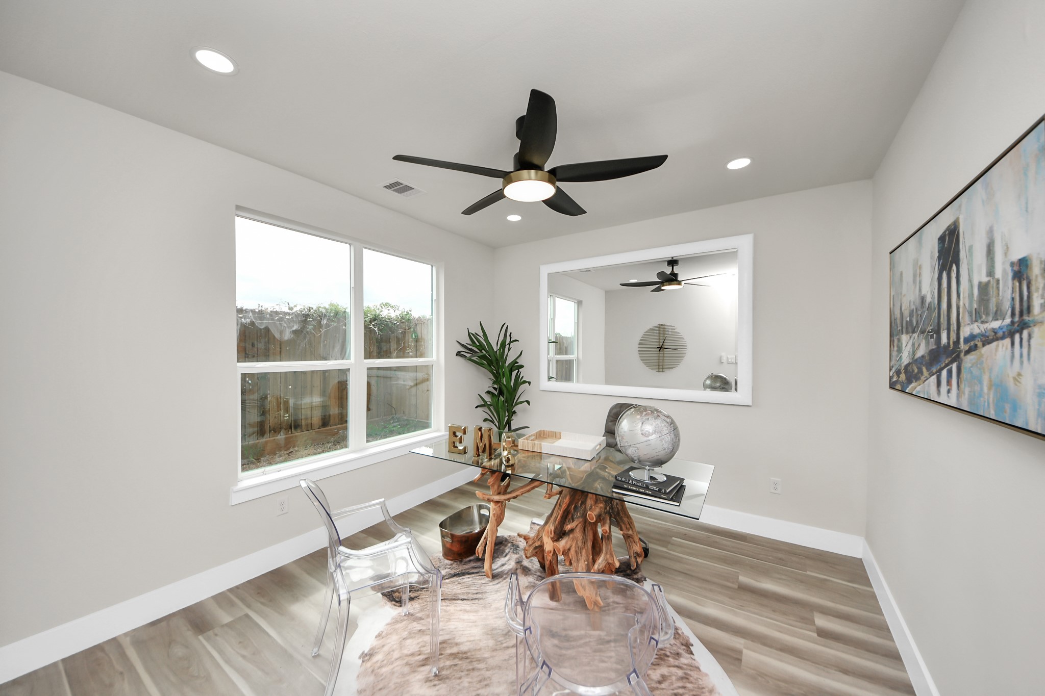 2016 Blodgett Street Houston, TX 77004 - Photo 7 of 49 a living room with furniture a window and a chandelier