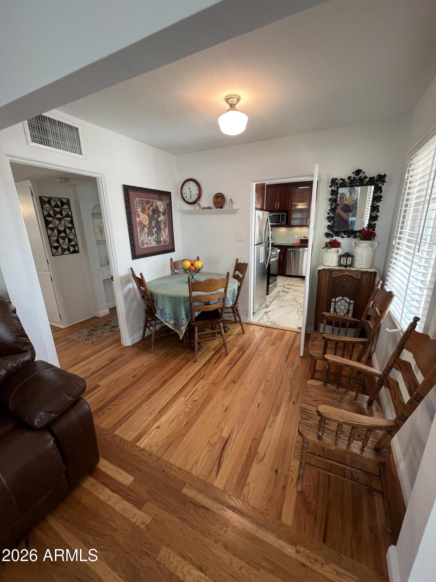 1326 East Coronado Road Phoenix, AZ 85006 - Photo 6 of 36 a living room with furniture and wooden floor