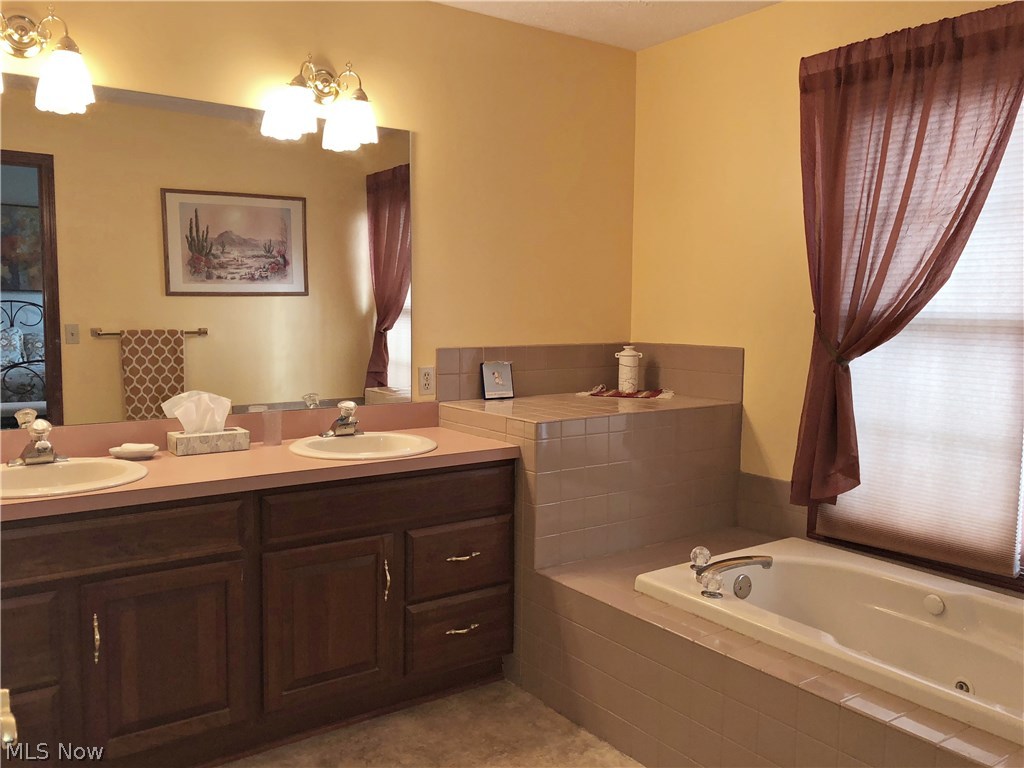 7695 Roeper Road Cleveland, OH 44134 - Photo 17 of 31 Cherry Vanity, Double Sinks, Jetted Tub and Separate Shower