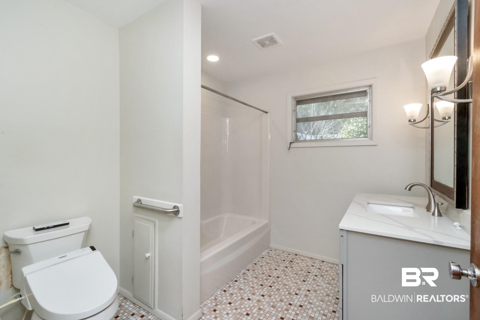 5412 South Norden Drive Mobile, AL 36608 - Photo 28 of 38 Full bathroom with tile patterned flooring, shower / bathing tub combination, vanity, and toilet