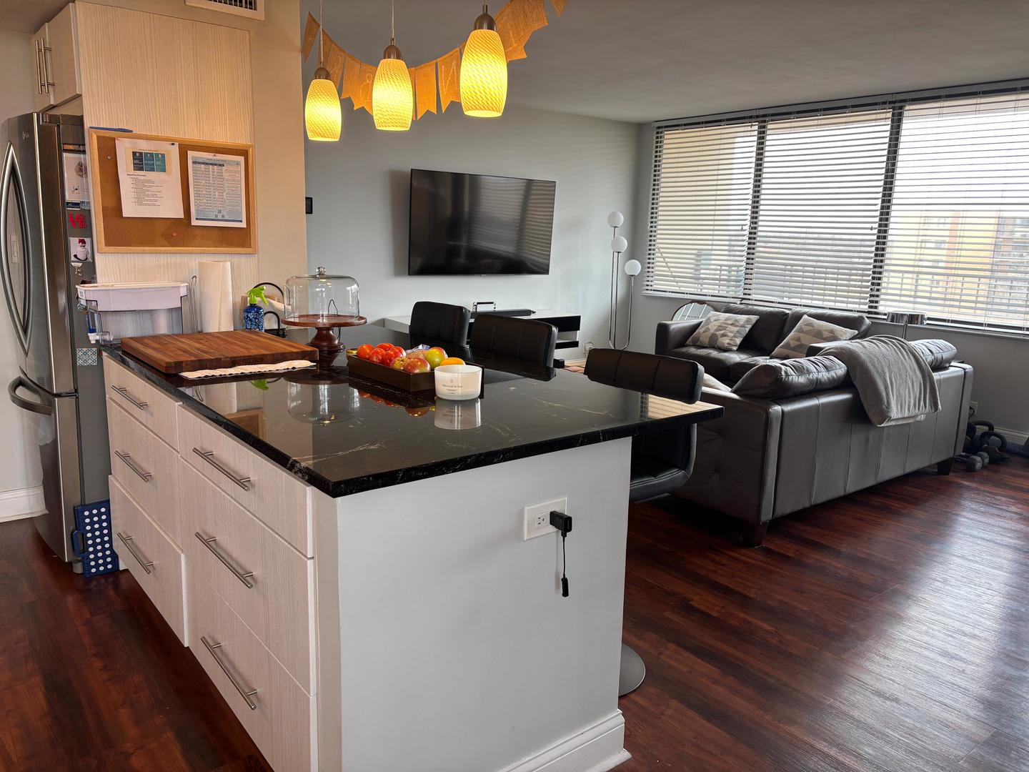 101 Bar Harbour Road, Unit 6M Schaumburg, IL 60193 - Photo 15 of 29 a kitchen with granite countertop a sink and a stove top oven