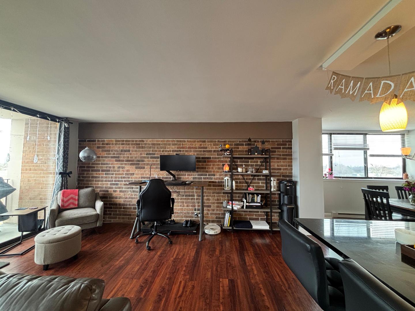 101 Bar Harbour Road, Unit 6M Schaumburg, IL 60193 - Photo 3 of 29 a living room with furniture and wooden floor