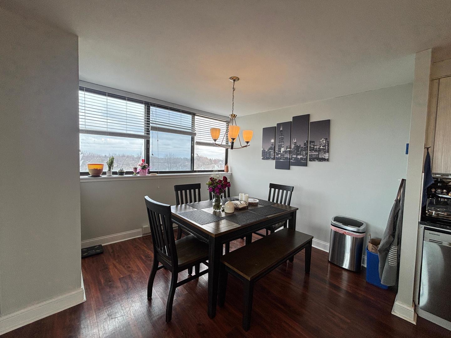 101 Bar Harbour Road, Unit 6M Schaumburg, IL 60193 - Photo 4 of 29 a view of a dining room with furniture window and wooden floor
