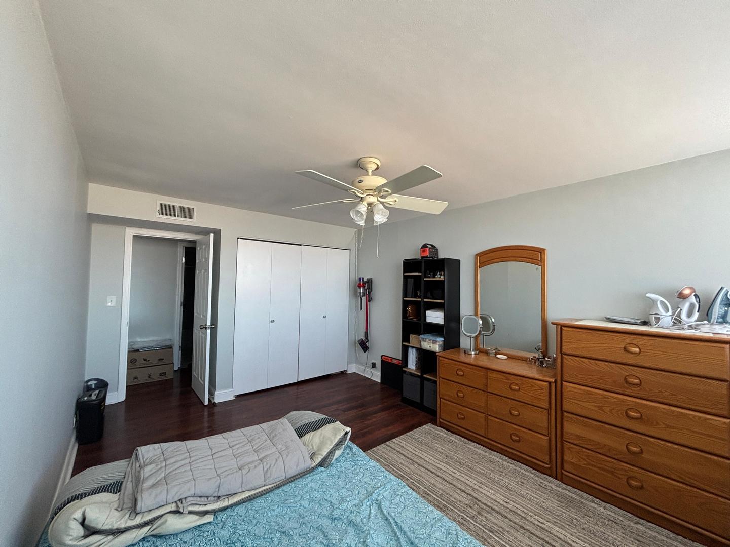 101 Bar Harbour Road, Unit 6M Schaumburg, IL 60193 - Photo 6 of 29 a living room with furniture and wooden floor