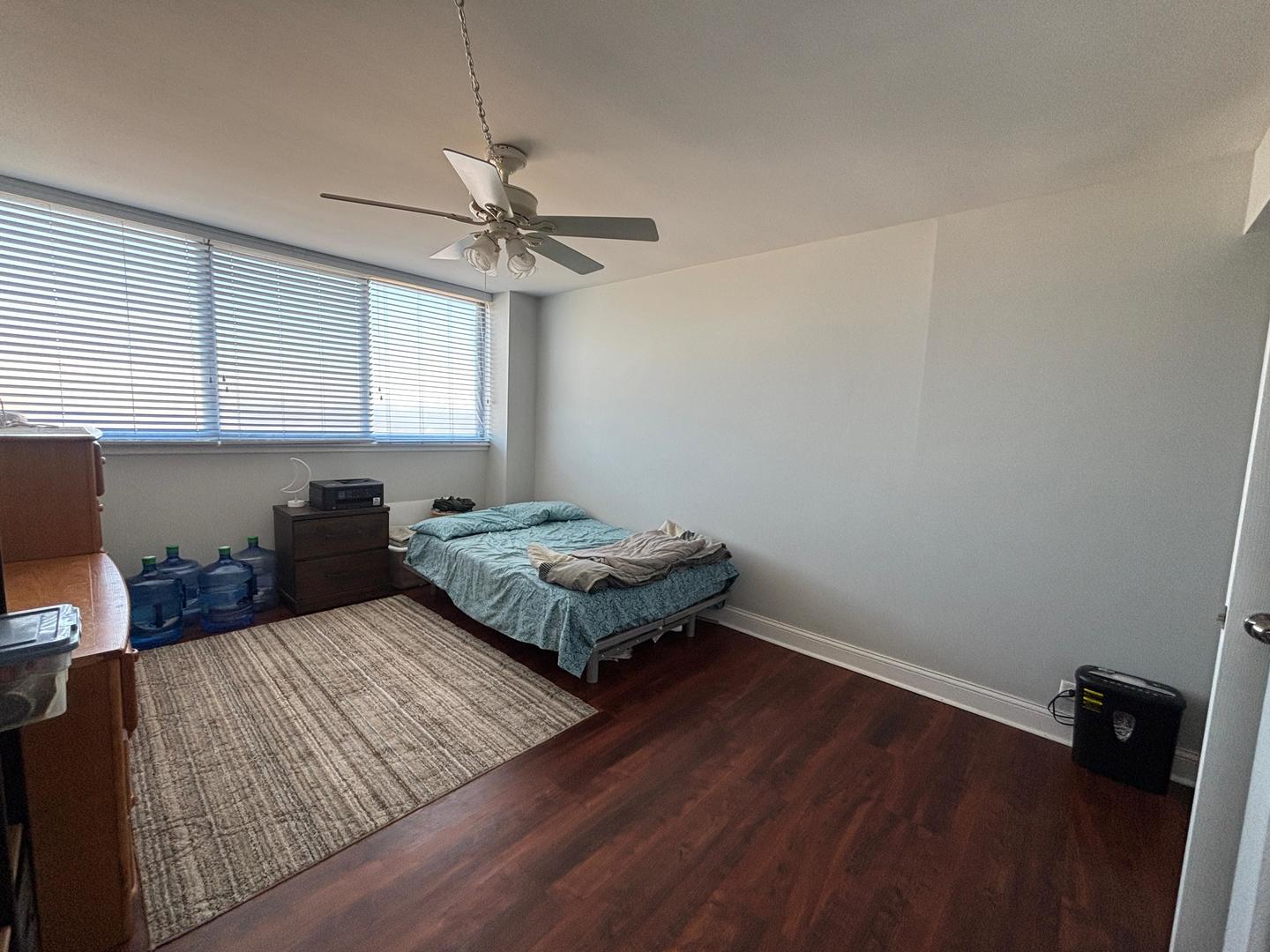 101 Bar Harbour Road, Unit 6M Schaumburg, IL 60193 - Photo 7 of 29 a bedroom with a bed and a window