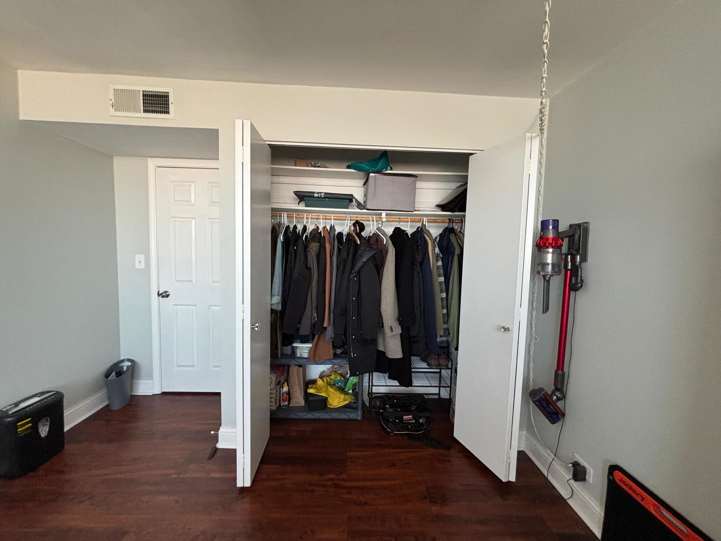 101 Bar Harbour Road, Unit 6M Schaumburg, IL 60193 - Photo 9 of 29 a view of walk in closet with clothes and shoes