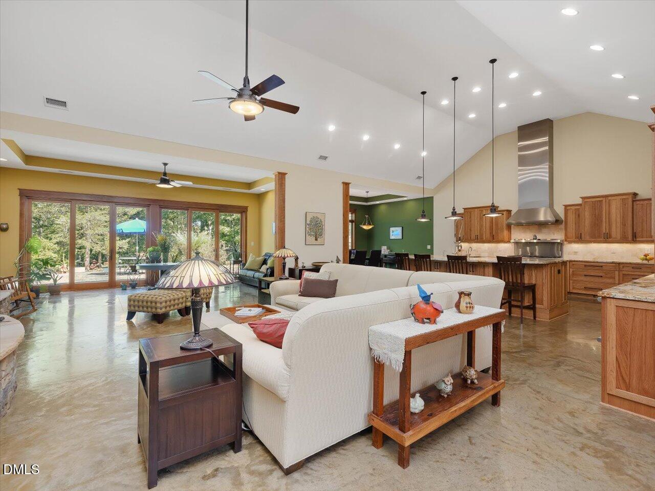 1210 Manco Dairy Road Pittsboro, NC 27312 - Photo 99 of 99 a living room with furniture and a large window