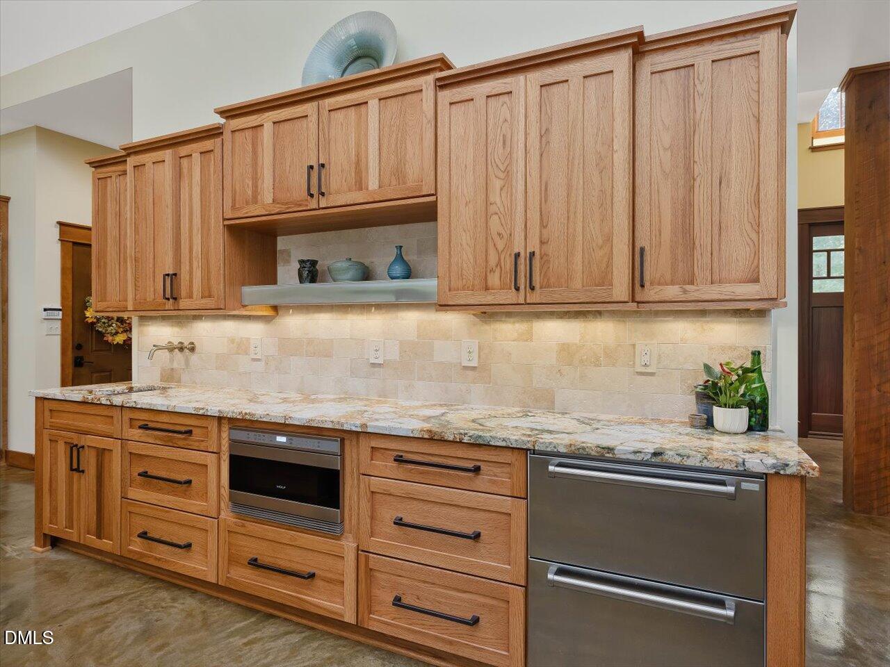 1210 Manco Dairy Road Pittsboro, NC 27312 - Photo 29 of 99 a kitchen with granite countertop cabinets and window
