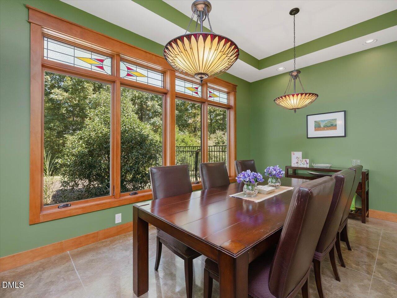 1210 Manco Dairy Road Pittsboro, NC 27312 - Photo 46 of 99 a view of a dining room with furniture window and outside view