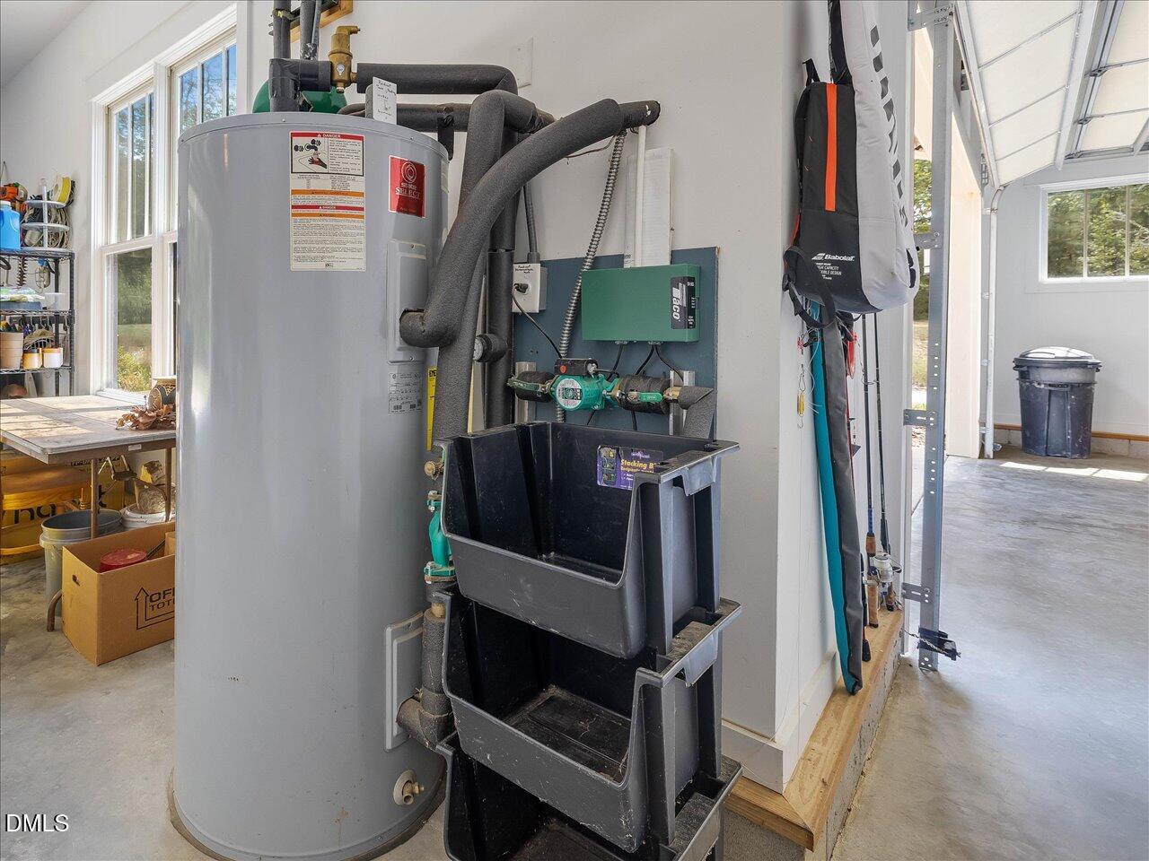 1210 Manco Dairy Road Pittsboro, NC 27312 - Photo 77 of 99 a view of walk in closet with clothes and shoes