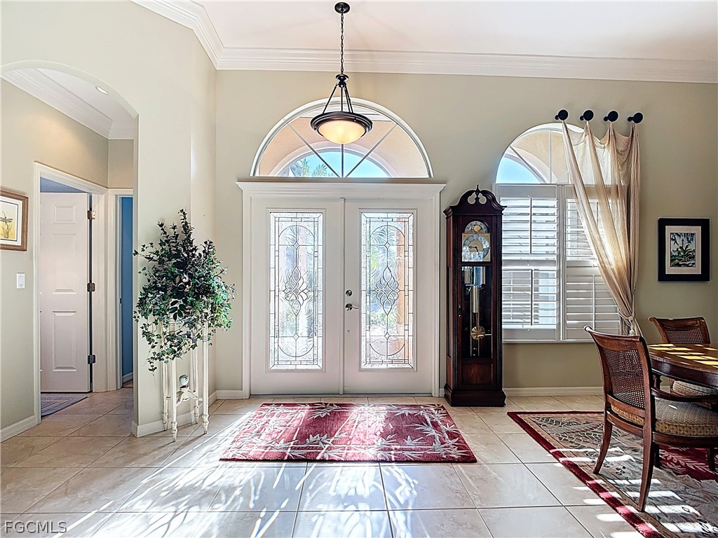 a view of hall way with furniture