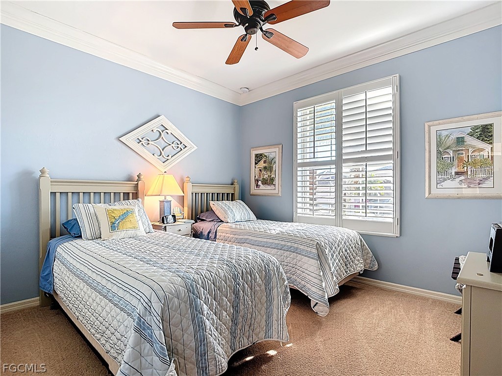 20763 Athenian Lane North Fort Myers, FL 33917 - Photo 22 of 49 a bedroom with a bed and window