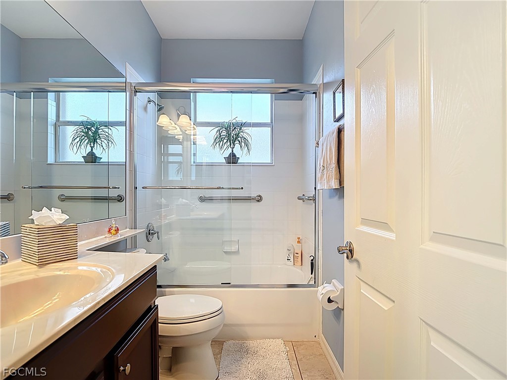 20763 Athenian Lane North Fort Myers, FL 33917 - Photo 23 of 49 a bathroom with a sink toilet and shower