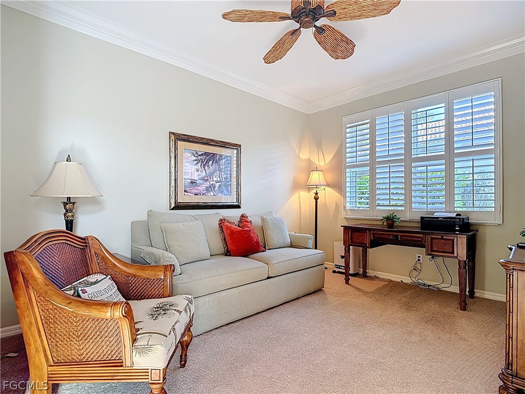 20763 Athenian Lane North Fort Myers, FL 33917 - Photo 26 of 49 a living room with furniture and a window