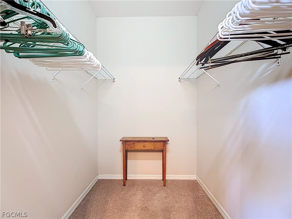 20763 Athenian Lane North Fort Myers, FL 33917 - Photo 30 of 49 a view of a room with racks on the wall