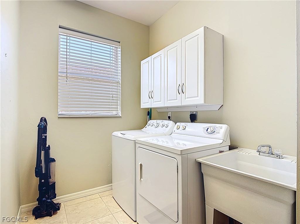 20763 Athenian Lane North Fort Myers, FL 33917 - Photo 34 of 49 a utility room with dryer and washer