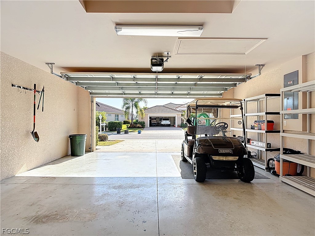 20763 Athenian Lane North Fort Myers, FL 33917 - Photo 35 of 49 a view of parking garage with cars
