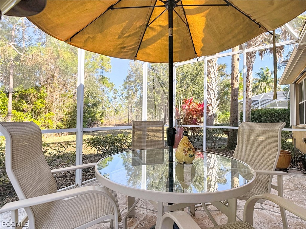 20763 Athenian Lane North Fort Myers, FL 33917 - Photo 41 of 49 a view of balcony with furniture and garden