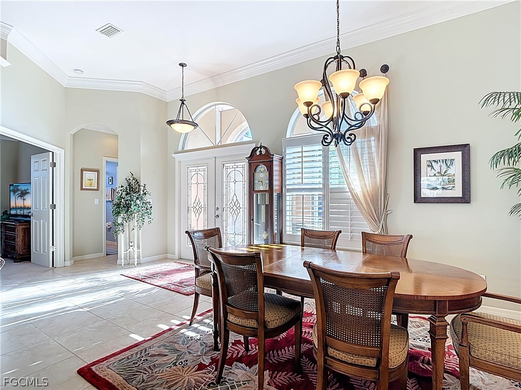 20763 Athenian Lane North Fort Myers, FL 33917 - Photo 7 of 49 a view of a dining room with furniture window and wooden floor