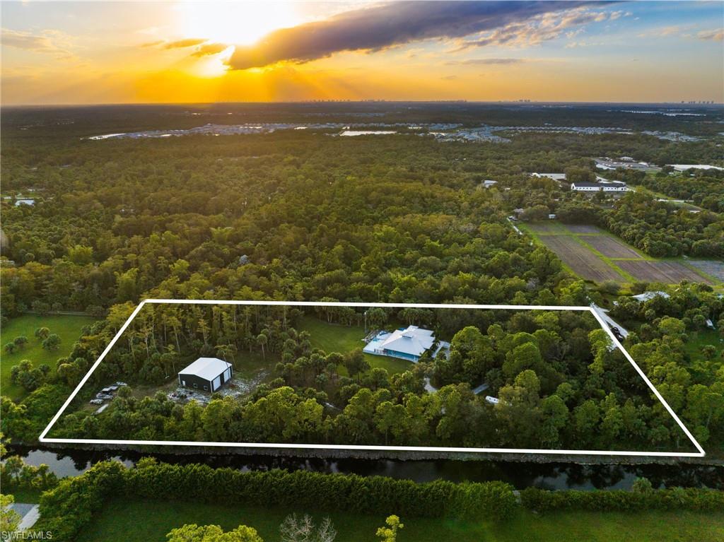 911 Mingo Drive Naples, FL 34120 - Photo 3 of 50 a view of a balcony
