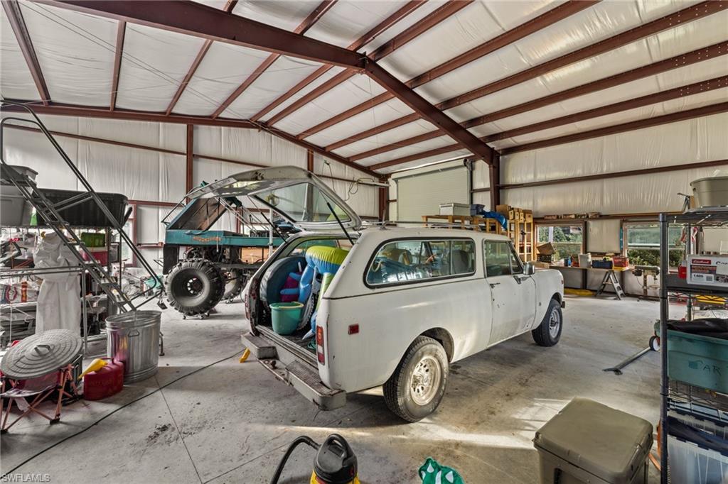 911 Mingo Drive Naples, FL 34120 - Photo 31 of 50 a view of car garage