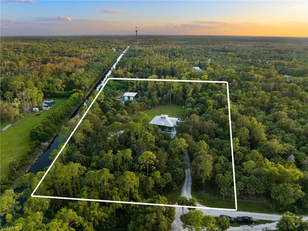 911 Mingo Drive Naples, FL 34120 - Photo 42 of 50 a view of a balcony with an outdoor space