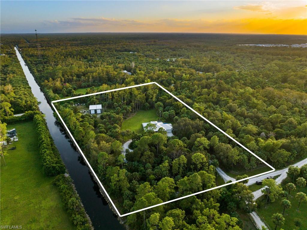 911 Mingo Drive Naples, FL 34120 - Photo 43 of 50 a view of a balcony with ocean view