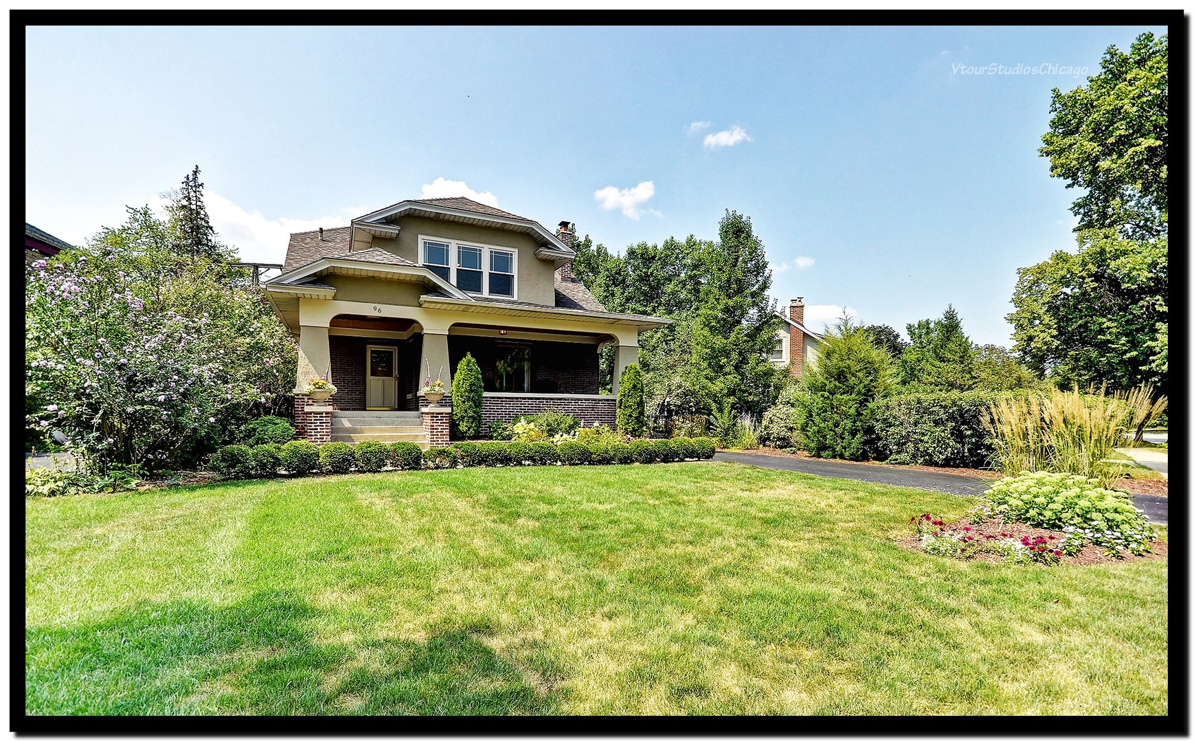 96 North Delaplaine Road Riverside, IL 60546 - Photo 1 of 25 a front view of a house with a yard