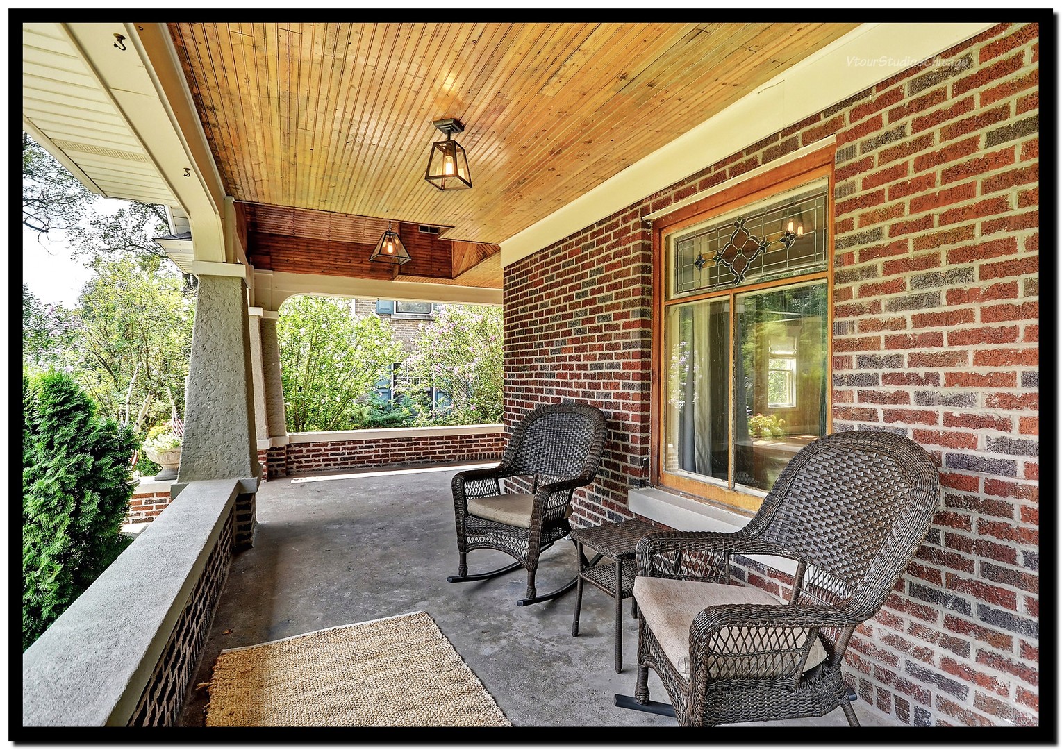 96 North Delaplaine Road Riverside, IL 60546 - Photo 3 of 25 a view of a patio with table and chairs and potted plants