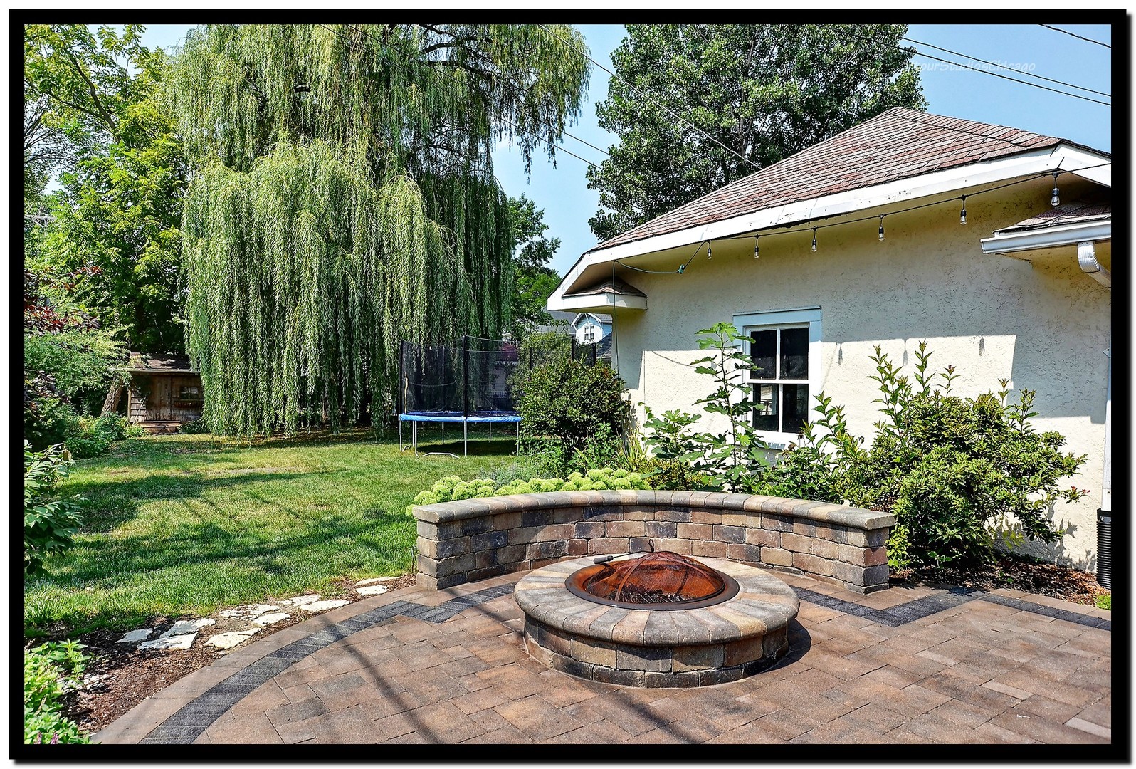 96 North Delaplaine Road Riverside, IL 60546 - Photo 23 of 25 a patio with a yard
