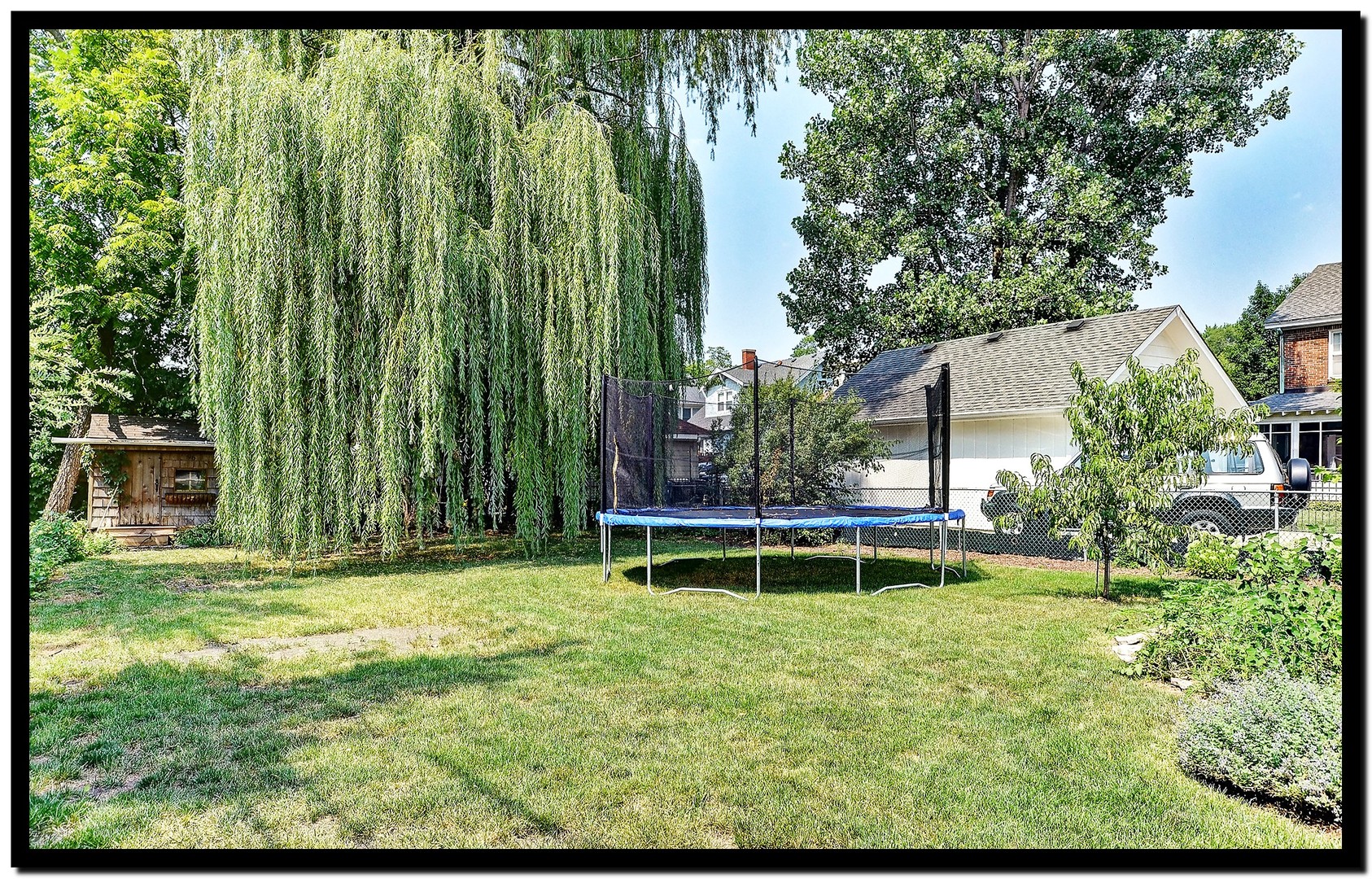 96 North Delaplaine Road Riverside, IL 60546 - Photo 24 of 25 a view of a swimming pool with a yard