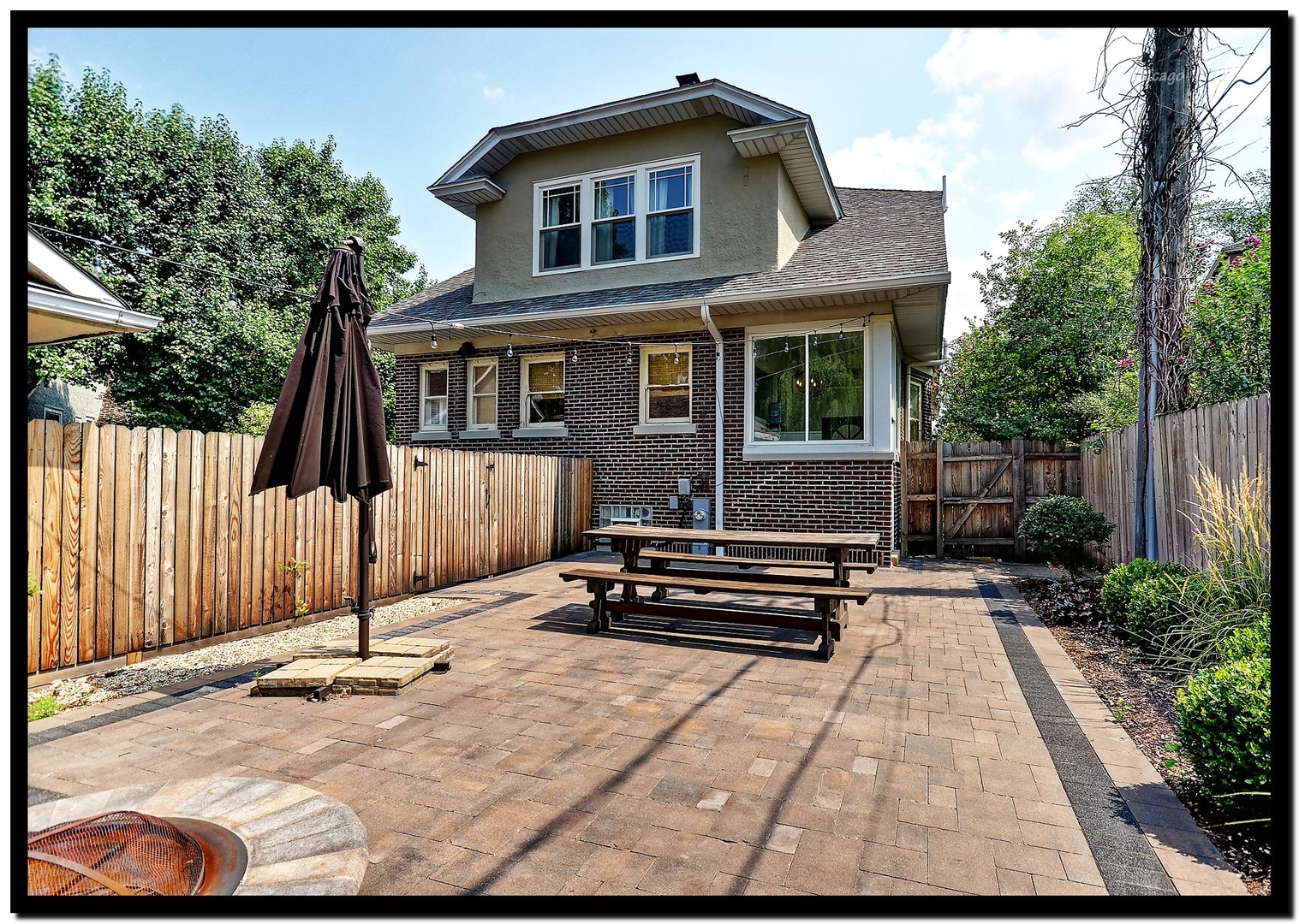 96 North Delaplaine Road Riverside, IL 60546 - Photo 25 of 25 a view of a house with backyard and wooden fence